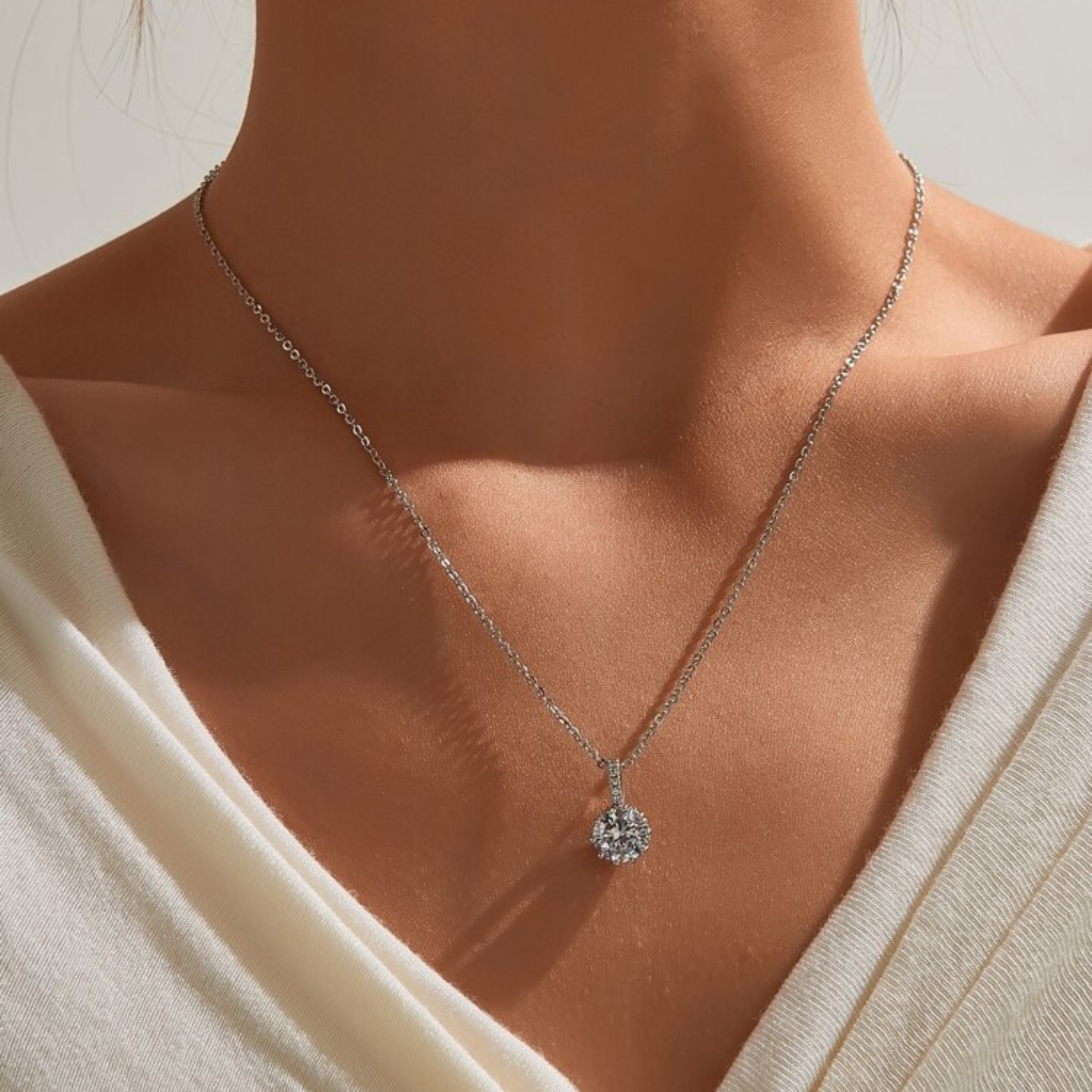 Elegant silver pendant necklace with a sparkling gemstone, perfect gift for her from Neolux